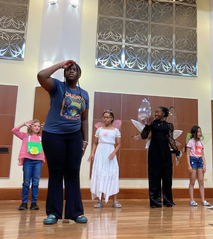 Students performing onstage