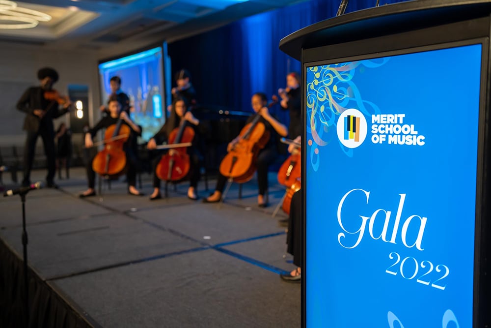 Strings ensemble performing at the Merit gala