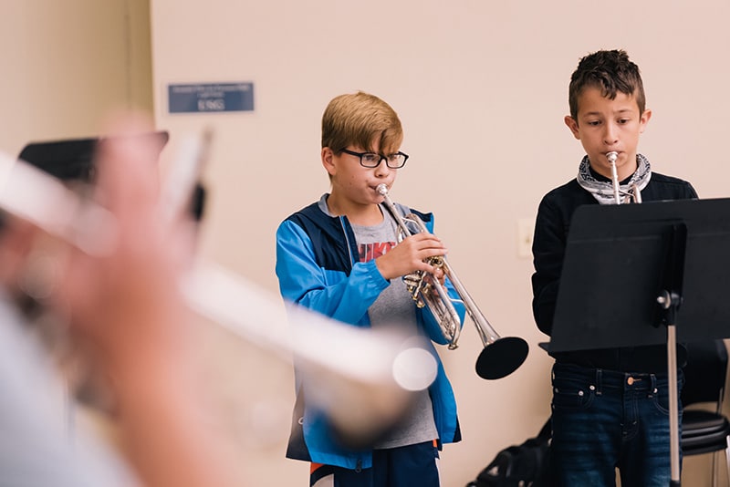 trumpet students in a group class