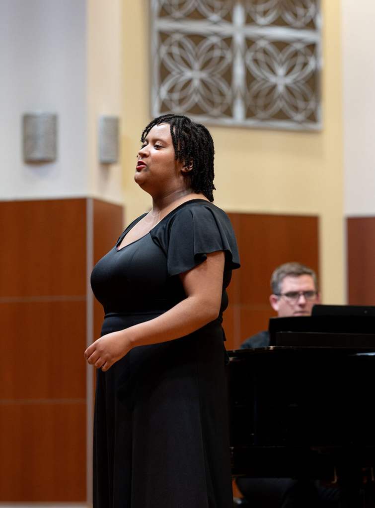 A solo vocal performance during a concert