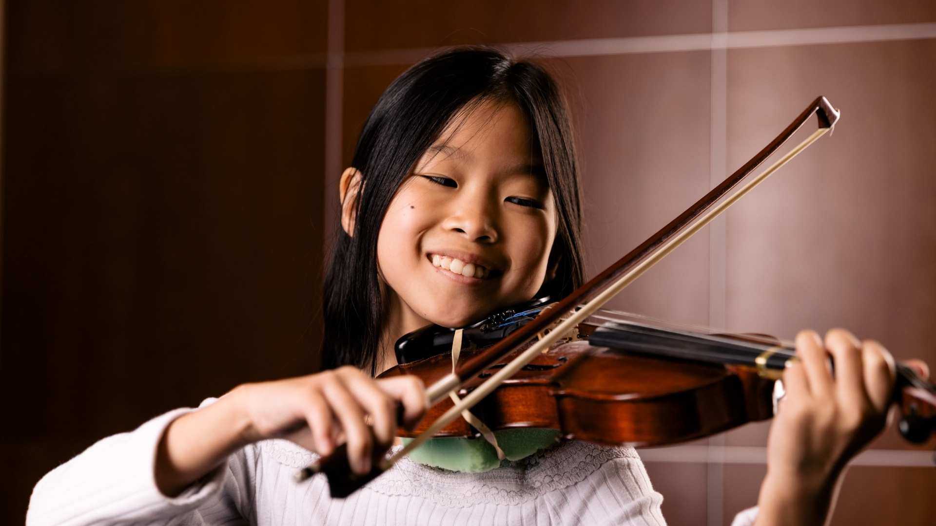 A student plays violin