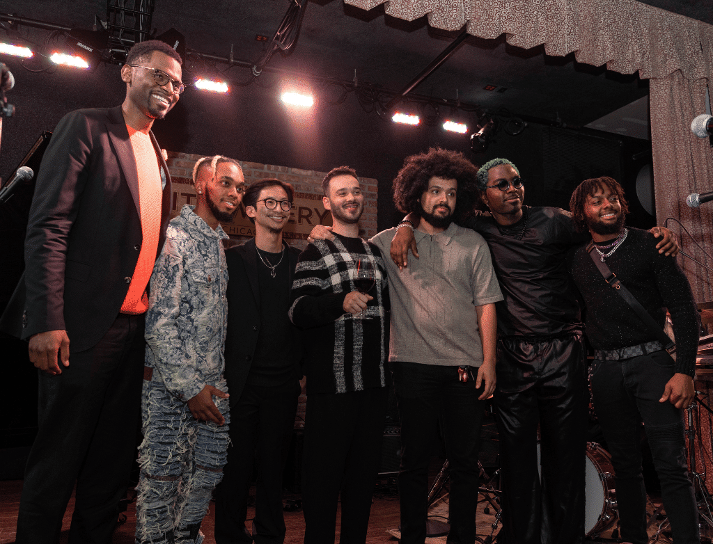 The members of King Melik and The JuJu Exchange pose onstage after the Play On performance.