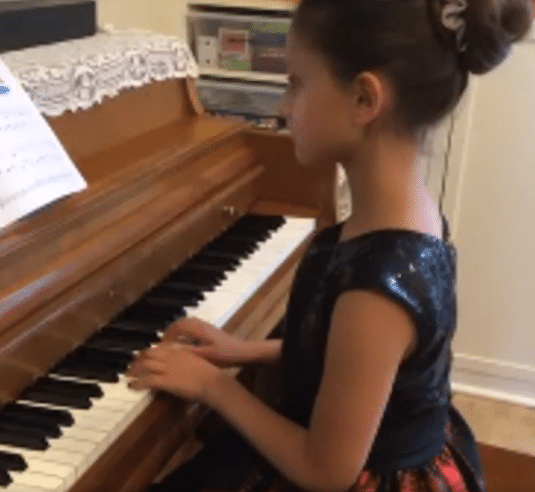 merit piano student performing online