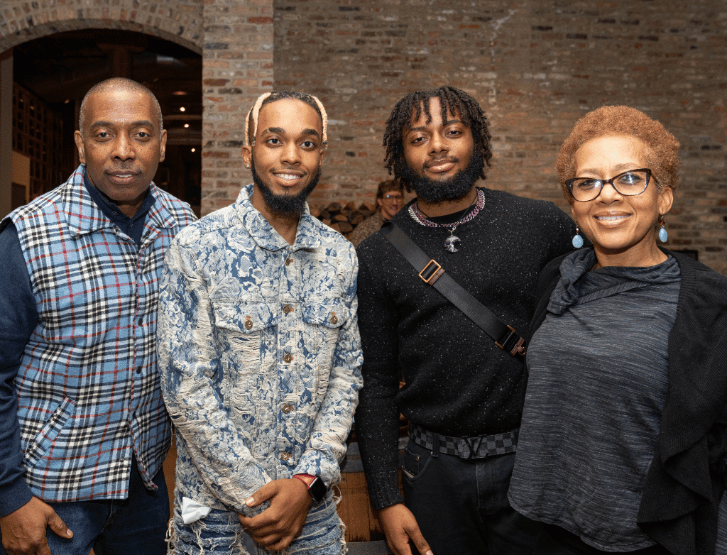 Bryce and Bruce with their parents after Play On.